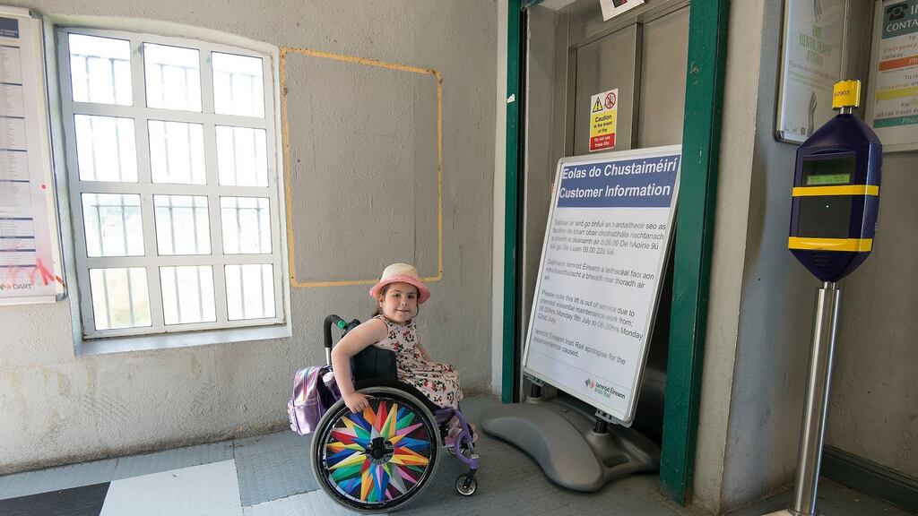 Sophia Mulvany (9), who has spina bifida, at Seapoint Dart station, where the lift is out of order. Photograph: Dave Meehan