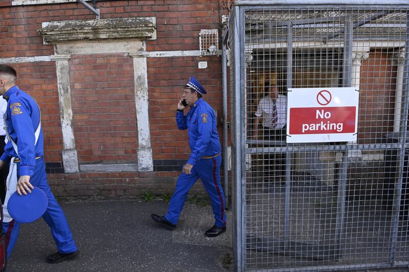 Band members of the Orange Order prepare at Clifton Street Orange Hall to parade on the streets in Belfast. Photo: EPA/Shutterstock