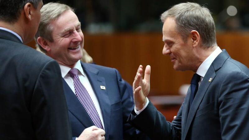 Taoiseach Enda Kenny listens to his Polish counterpart Donald Tusk (R) during a European Union leaders summit in Brussels this evening. Photograph: Francois Lenoir/Reuters.
