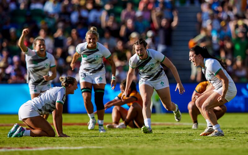 Ireland's Megan Burns and Lucy Mulhall celebrate at the full-time whistle following the victory over Australia in Perth. Photograph: Travis Hayto/Inpho
