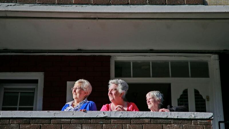 Charlemont Street regeneration: residents Mary Sheehy, Pat Lynch and Nena Bassett look on from the old complex. Photograph: Nick Bradshaw