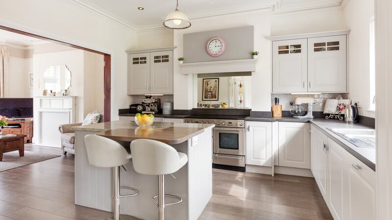 Kitchen through to front room at 140 New Cabra Road
