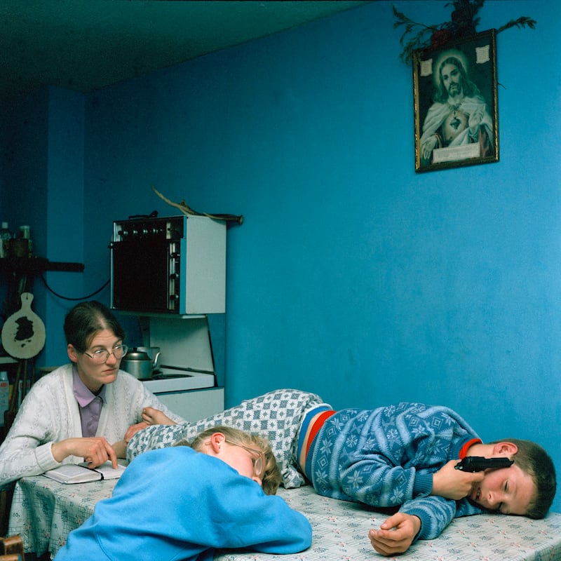 Anthony Haughey, Mother and Children with Bible and Gun was taken in the Ballymun Towers