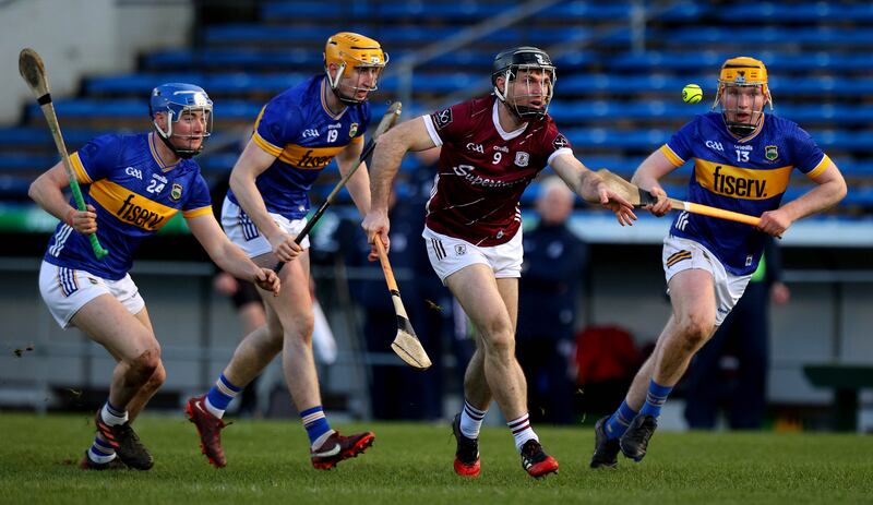 Tipperary’s Billy Seymour and Sean Kenneally with Sean Linnane of Galway. Photograph: Ryan Byrne/Inpho

