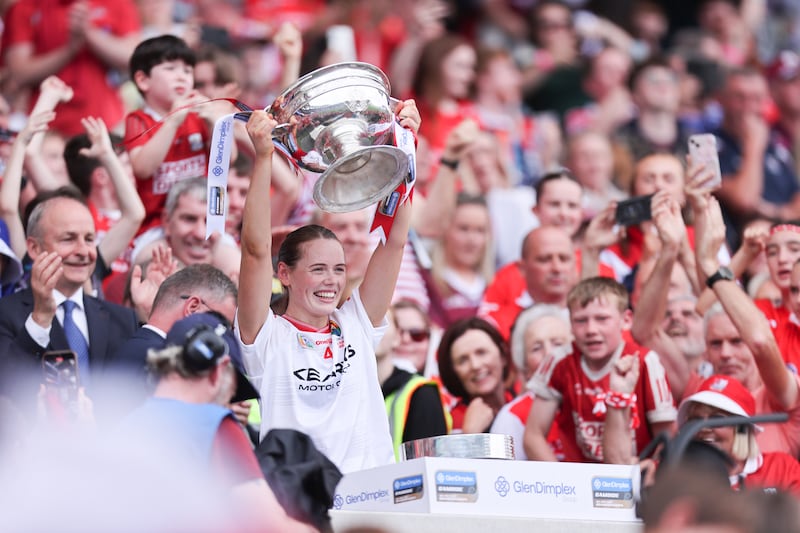 Cork captain Méabh Cahalane lifts the O’Duffy Cup. Photograph: Tom Maher/Inpho