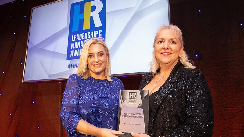 Dr. Sinéad Brennan, awards judge, presents the Most Effective Use of Internal Communications award to Julie Sharp, Brown Thomas Arnotts.