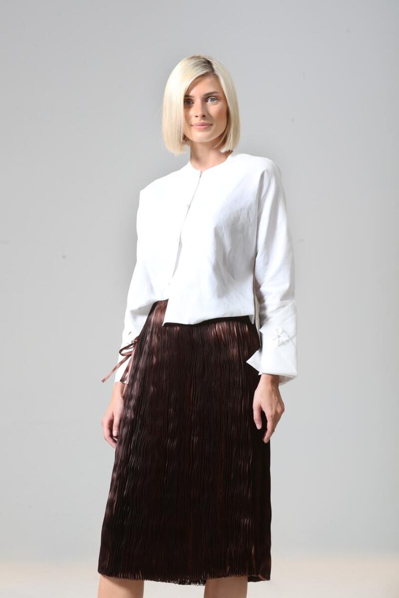 White organdie and poplin shirt with handstitched detail (€485)  and ribbon skirt (€860),  by Helen Hayes