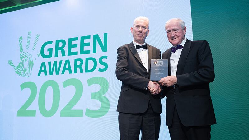 Tom Donnellan, chief executive, Bord na Móna, presents the Green Leader 2023 to Mr. Eddie O'Connor, Supernode.