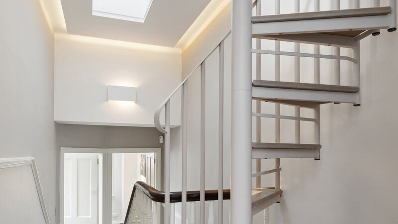 Spiral staircase to attic space.