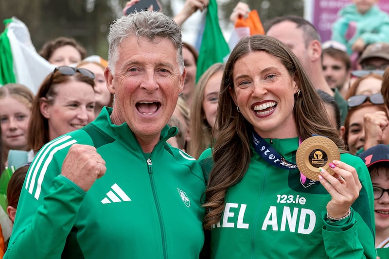 Ireland’s Kate O’Connor celebrates with her father and coach Michael O’Connor at the women’s heptathlon medal ceremony. Photograph: Morgan Treacy/Inpho