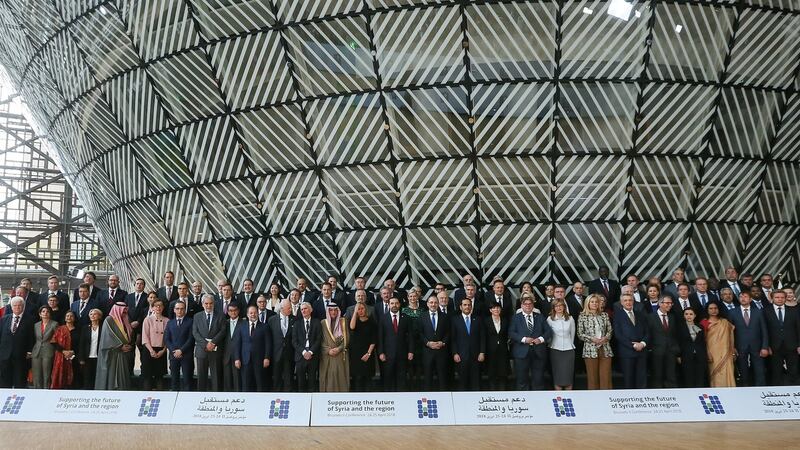 Delegates pose for a family photo during the Supporting the Future of Syria and the Region conference at the European  Council headquarters in Brussels, Belgium, on Wednesday. Photograph: Olivier Hoslet/EPA