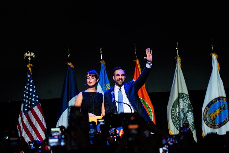 Zohran Mamdani is joined onstage by his wife, Rama Duwaji, at his election night event at the Paramount Theater in Brooklyn, Nov 4, 2025. Photograph: Amir Hamja/The New York Times