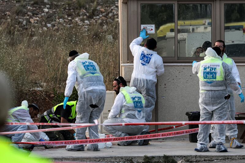 Israeli forensics experts inspect the scene of an attack near the Jewish settlement of Eli in the north of the occupied West Bank on June 20th. Four people were shot dead. Photograph: Ahmad Gharabli/AFP via Getty