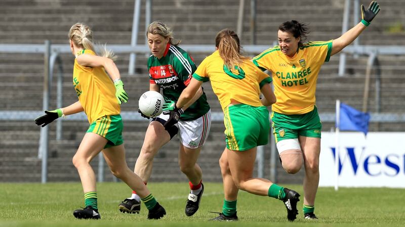 Mayo’s Cora Staunton under pressure. Photograph: Donall Farmer/Inpho