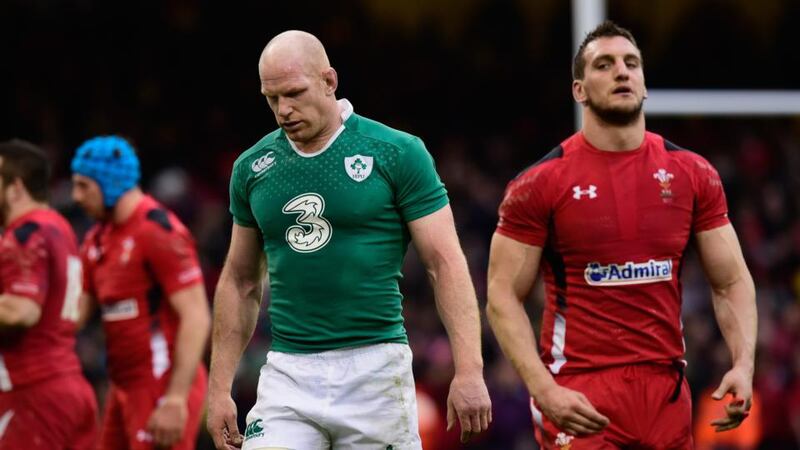 Ireland captain Paul O’ Conell  leaves the field as Sam Warburton looks on after the match. Photograph: Stu Forster/Getty Images