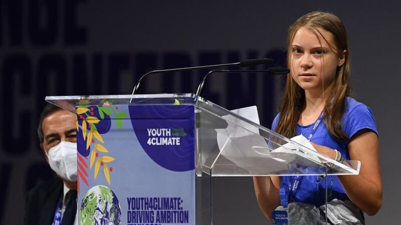 Swedish climate activist Greta Thunberg delivers a speech  at the Youth4Climate event in Milan: ‘This is all we hear from our so-called leaders: words.’ Photograph: Miguel Medina/AFP via Getty Images