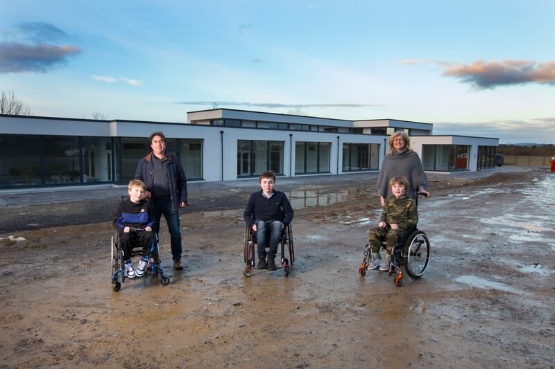 The Naughton family outside their new purpose-built home in Co Roscommon, which is nearing completion. Photograph: Brian Farrell
