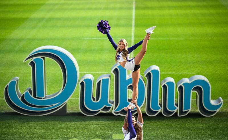 Kansas State University and Iowa State University cheerleaders at the Aviva Stadium. Photograph: Ramsey Cardy/Sportsfile