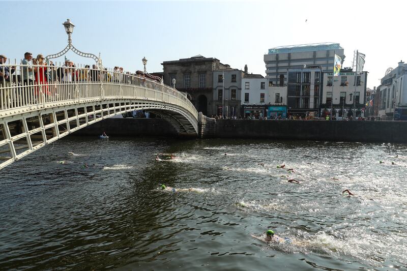 A view of the women’s race as it passes the Ha’penny Bridge. Photograph:  Inpho/Ben Brady