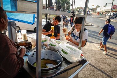 A food stall in Santiago. Officials have been particularly alarmed by Chile’s childhood obesity rates, with over half of 6-year-old children overweight or obese.