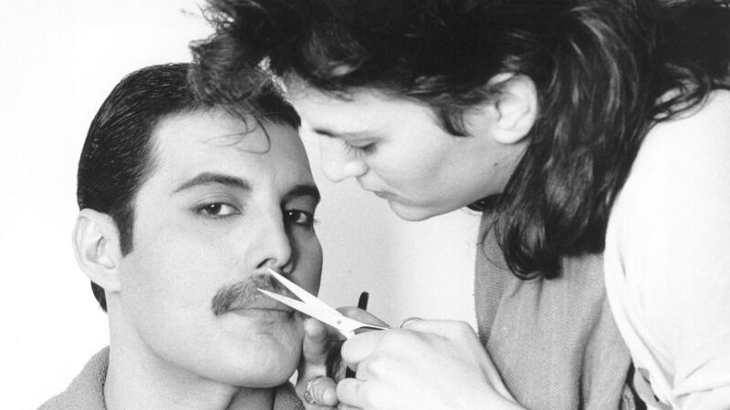 Freddie Mercury  gets his moustache groomed, circa 1982. Photograph: Steve Wood/Express/Getty Images