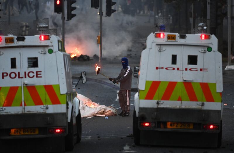 Protesters confront police on a second night of unrest in Ballymena, Co Antrim. Photograph: Charles McQuillan/Getty Images