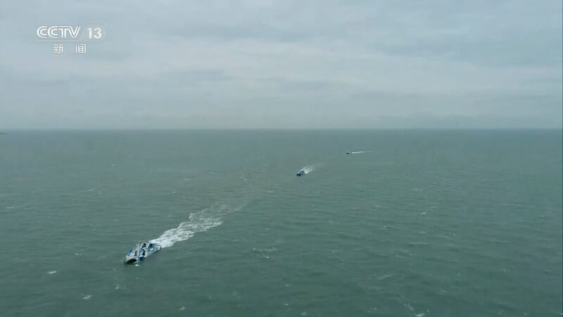 Chinese TV showed warships sailing in the Taiwan Strait on Saturday. Photograph: CCTV via AP