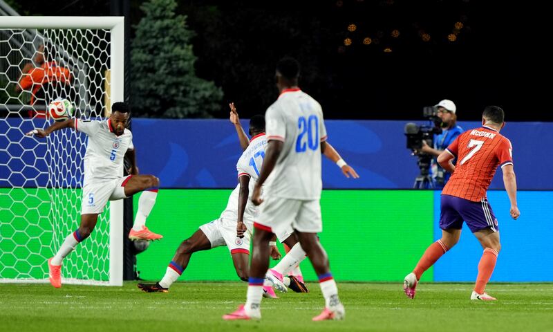 Scotland's John McGinn scoring the opening goal during the World Cup Group C match against Haiti at the Boston Stadium, Foxborough. Photograph: Andrew Milligan/PA Wire.