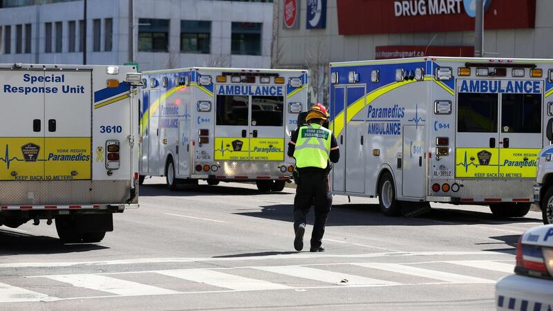 Several ambulances and paramedics attend the scene after a van hit multiple pedestrians in Toronto. Photograph: Getty Images