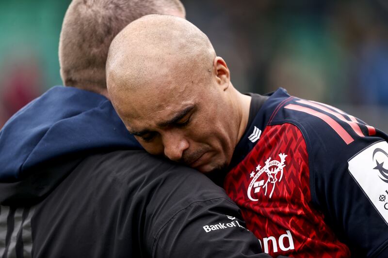 Munster's Simon Zebo with his head on head coach Graham Rowntree’s shoulder after the loss to Northampton. Photograph: Ben Brady/Inpho