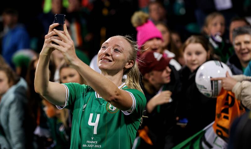 Ireland’s Louise Quinn takes photos with fans after the friendly international against France in Tallaght. Photograph: Ryan Byrne/Inpho