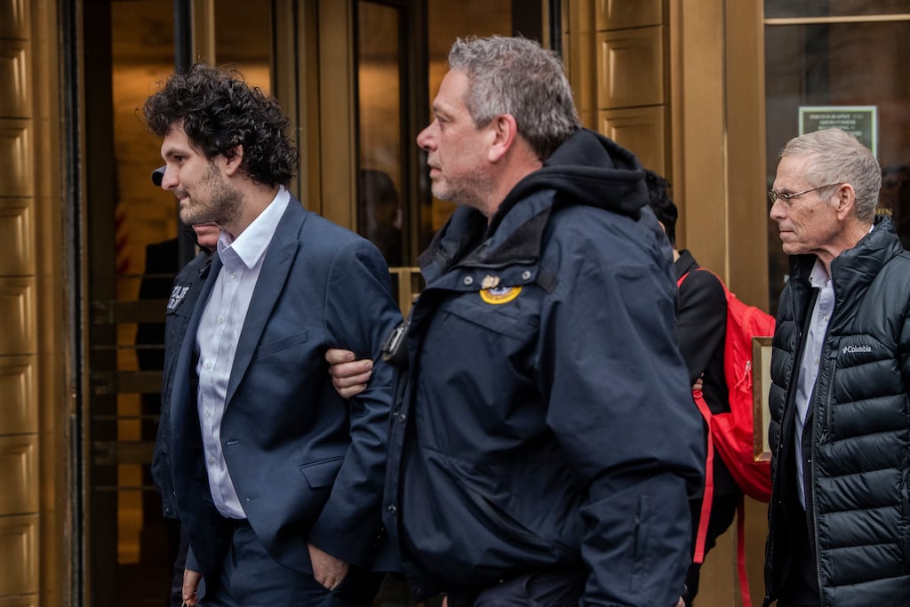 Sam Bankman-Fried and his father, Joe Bankman outside Federal District Court in New York in December. His downfall has chastened an industry that just last year was happy to fork out millions for Super Bowl advertising slots. Photograph: Brittainy Newman/The New York Times