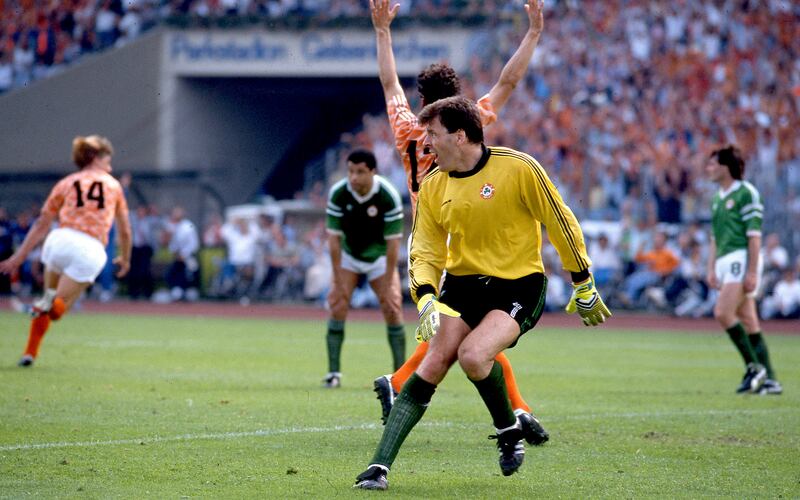 A dejected Packie Bonner reacts after Wim Kieft scores a late winner for the Netherlands against Ireland in the 1988 European Championships. Photograph: Billy Stickland/INPHO