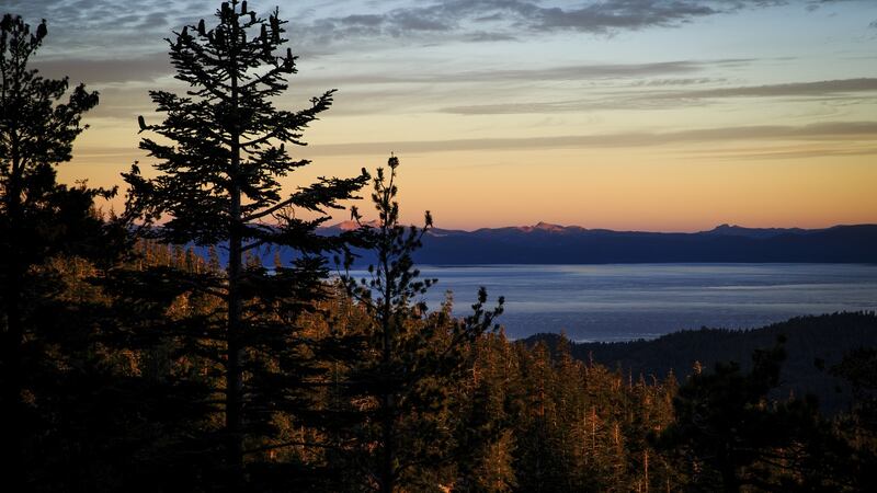 Lake Tahoe at sunrise from mile 104 of the Tahoe 200 ultramarathon in South Lake Tahoe, Nevada. Photograph: Max Whittaker/The New York Times