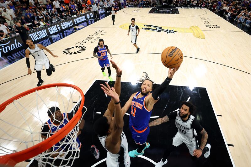 Jalen Brunson #11 of the New York Knicks shoots the ball against De'aaron Fox #4 of the San Antonio Spurs during the second half in Game 5 of the 2026 NBA Finals at Frost Bank Center in San Antonio, Texas. Photograph: Eric Gay /Pool/Getty Images