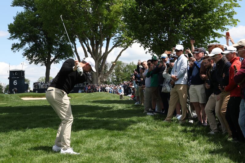 Rory McIlroy plays a shot on the sixth hole during the first round of the PGA Championship at Aronimink Golf Club on May 14, 2026 in Newtown, Pennsylvania. Photograph: Emilee Chinn/Getty Images