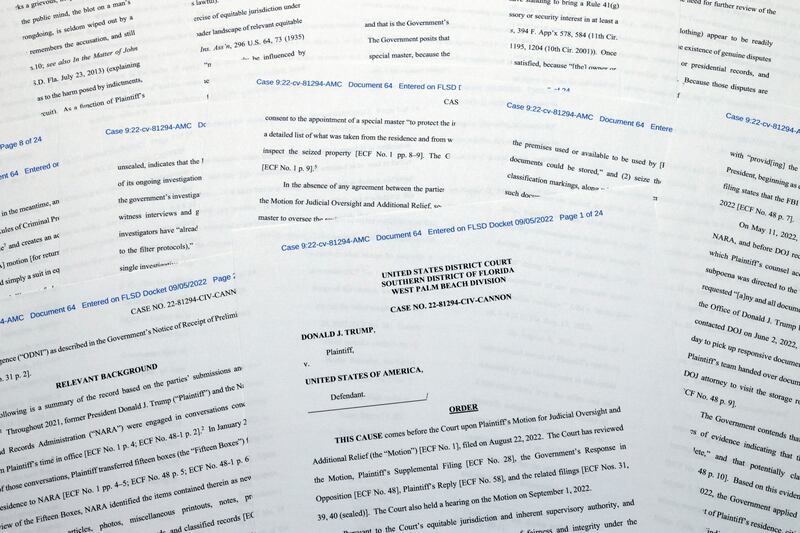 Pages from the order granting a request by former president Donald Trump’s legal team to appoint a special master to review documents seized by the FBI during a search of his Mar-a-Lago estate. Photograph: Jon Elswick/AP