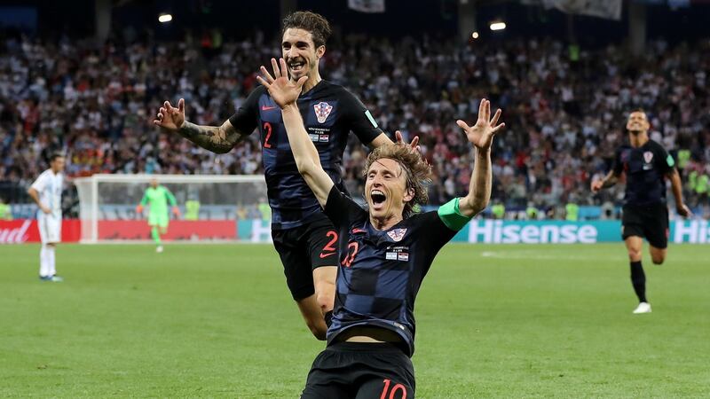 Luka Modric  celebrates after scoring his team’s second goal. Photograph: Elsa/Getty Images