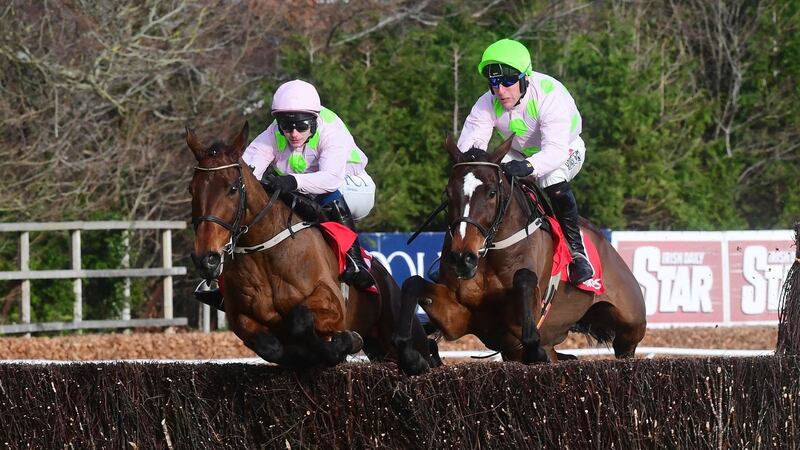 Chacun Pour Soi ridden by Paul Townend (left) jumps the second last fence on the way to winning the Ladbrokes Dublin Steeplechase during on day one of the Dublin Racing Festival at Leopardstown. Photograph:  PA Wire