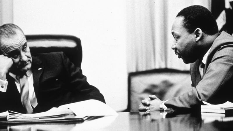 President Lyndon B Johnson and Martin Luther King discuss the Voting Rights Act  in 1965. Photograph: Hulton Archive/Getty Images