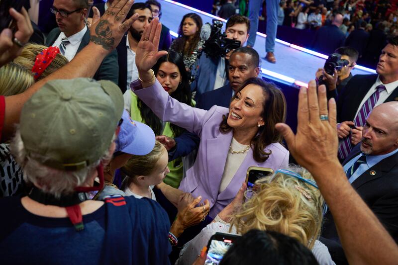Kamala Harris greets attendees as she departs a campaign rally in Las Vegas on August 10th. Photograph: Bridget Bennett/New York Times
                      