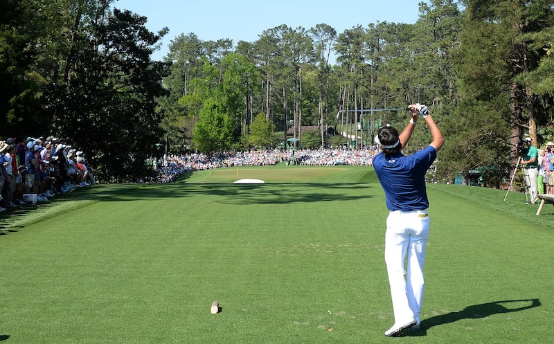 Spectators traditionally sit on the slope below the tee box at the sixth where players hit over them.
