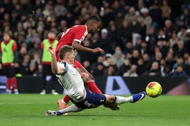 Liverpool hold off late challenge for dramatic win over nine-man Tottenham