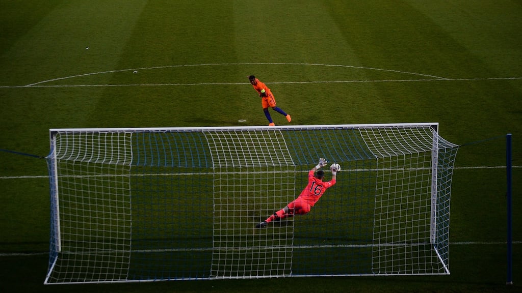 James Corcoran of Ireland saves a penalty from Daishawn Redan of the Netherlands but was then sent off for a second yellow card after coming of his line too early at Proact Stadium in Chesterfield, England. Photograph: Nathan Stirk/Getty Images