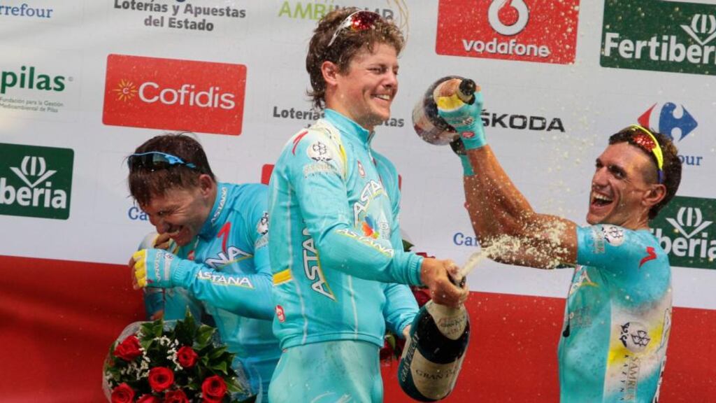 Astana Pro Team members celebrate on the podium after winning the first stage of the Tour of Spain “La Vuelta” cycling race, a 27.4 km (17 miles) team time-trial between Vilanova de Arousa and Sanxenxo. Photograph:
Miguel Vidal/Reuters