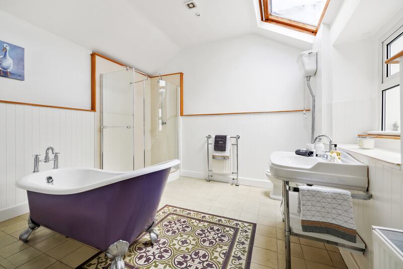 The family bathroom has a slipper bath