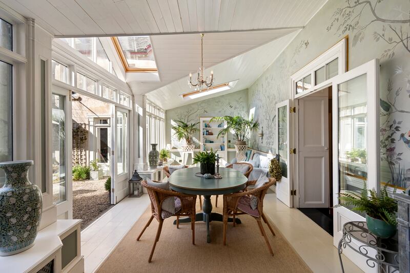 Conservatory with murals by current owner, artist Jane Willoughby