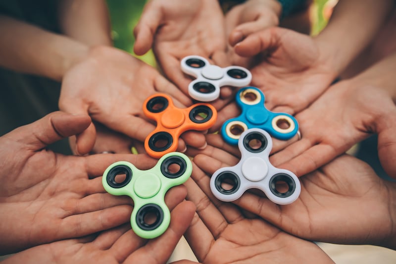 In the run-up to Christmas 2016, Forbes magazine described fidget spinners as the 'must-have office toy for 2017'. Photograph: Getty Images