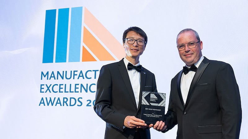 Dr Guangbo Hao, secretary at Irish Manufacturing Council, presents the best use of technology award to Cormac McAteer, Seagate Technology