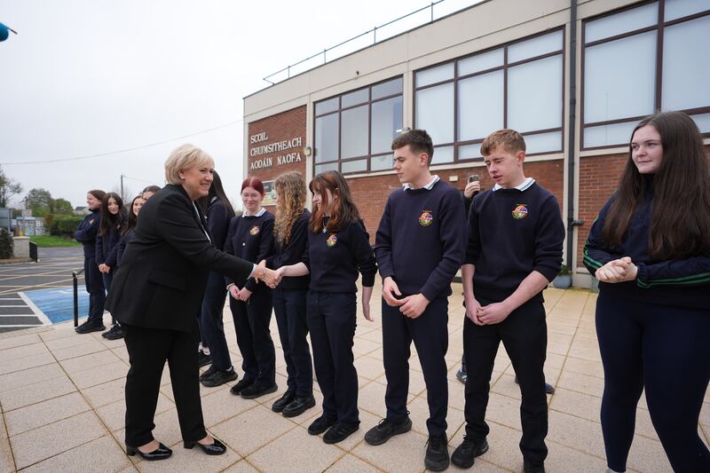 Humphreys meets students outside the school. Photograph: Niall Carson/PA Wire